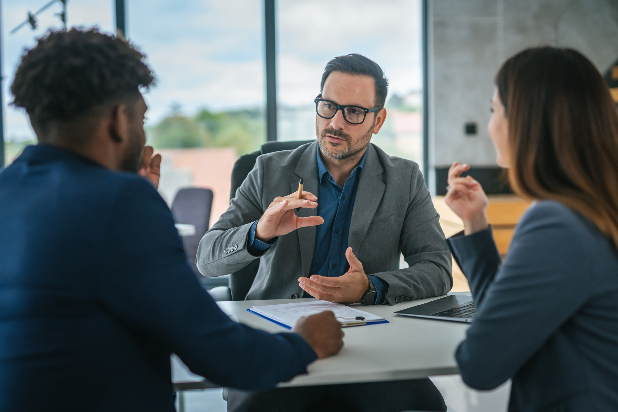 Financial advisor meeting with clients
